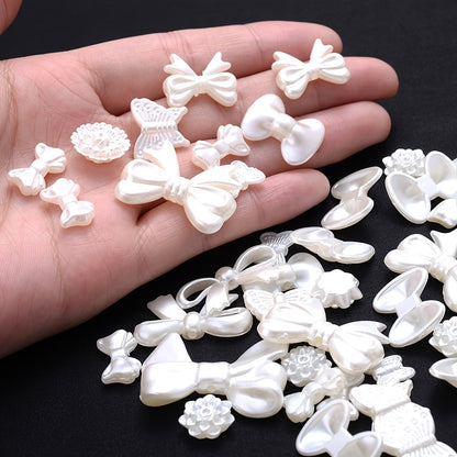 100PCS 9–28mm White Acrylic Bow, Flower & Butterfly Bead Set
