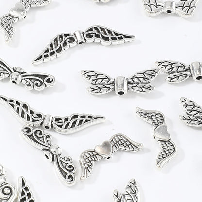 100-Piece Alloy Angel Wing Pendant Charms